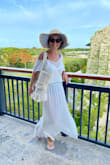 This is more sheer than I was hoping for - you can see right through to your bathing suit. The top flopped off my shoulders a bit. Length is perfect. I did end up cutting off the beads in the front V-neck. - Rebecca M.