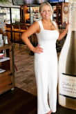 I wore this for my bridal shower in the end of May and it was perfect! I have always loved jumpsuits. I am short and I did have the pant legs hemmed a couple inches but came out great. I received so many compliments on my outfit, I wish I had somewhere to wear it again! - Fallon N.