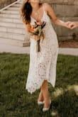 I absolutely loved this dress and it was perfect for our simple courthouse wedding. It's elegant and the lace is beautiful. It has a perfect skincolored dress underneath as well for coverage. I'm a normal size medium and it fit me like a glove. The only reason it doesn't get a full 5 star review is because of the cleavage and the straps. The straps are a bit thin and tend to twist. The cleavage is sewn a bit weird making the tan fabric inside show and I didn't like the look of that. However it's a gorgeous dress and can definitely be born without a bra as well. It is a bit plungy tho. - Jennifer W.