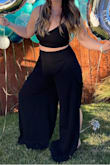 I bought this to wear for my birthday and it was perfect! So many compliments! I'm more athletic build, have bigger boobs, and a bigger butt, but it fit great. The top you can tie tighter so you have support without wearing a bra (which I was a little worried about) but it supports well. The pants fit high enough on my waist and didn't slip down. The only thing is the pants I wore with flats and sometimes stepped on the pant leg but still was a great purchase. - Talyah I.