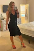 I have this in 2 colors. Soooo sexy and flattering! I was worried the buttons would pop open but I've worn this multiple times and never had an issue. Love it. - Amy H.