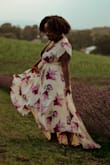 I had been eyeing this dress for weeks and I bought it as soon as I saw the email it had been restocked. I bought this dress to use in a photo shoot in a lavender field. When I put it on initially out of the box, my breasts were spilling out. It was honestly a disaster. But I decided to pair it with a bralette and I believe it worked amazingly well. I should have had it hemmed but I was working on a time constraint. The quality was AMAZING. I hand washed this dress a week after my shoot (where I was laying down in the hot, humid July sun for two hours) and the stains lifted well - Maya W.