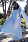 I love the dress. It make my bust look big lol. The material is good quality. Only one issue that is the end rip off very easy since you it drag over the floor. But it's a nice dress with the price. - Chananya J.