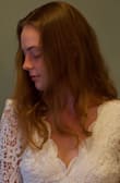 This is a lovely dress that daughter will wear on her weddings day on the cliffs of Ireland. O thing extravagant she said. The dress has lovely form  with a beautiful low cut back. - Heather F.