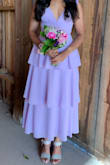 This dress is very cute! It fits great. The fabric is light and flowy so it's perfect for outdoor events. - Rebecca A.