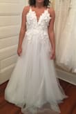 Didn't love this dress. The bodice is stiff and uncomfortable, and feels oddly proportioned - not delicate at all, and makes me feel like I'm hiding my small bust. Quality is fine but nothing special. Overall it didn't wow me. - Carolyn C.