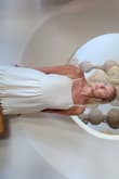 This dress was a hit at the resort for our vow renewal. I would have worn it to a beach wedding though! Gorgeous and fit perfectly. I tied it in the back but you can tie it in the front too! It is a cream color but looks great on blondes with a tan. It fit just right in the chest and I'm small on top but larger on the bottom. A must have for a beach vacation! - Megan E.