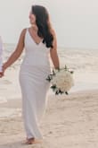 Bought this dress for my Florida elopement ceremony and it absolutely exceeded my expectations. I had it hemmed a little on the bottom but only because it was a little longer than what I needed. Other than that the dress fit like a glove. Definitely worth the buy! - Banesa A.