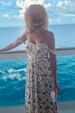 I wore this on my recent Birthday cruise and it was perfect!  It fit great, and like so many others have stated, I received NUMEROUS comments from friends but also from cruise ship staff and other random cruise ship guests!  Can't wait to wear it again. You do have to always be aware of the high slits, because even the breeze from walking, or going up stairs, can maybe show more than you're wanting.  I wouldn't let that stop you from wearing it though! - Julie W.