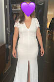 The dress is beautiful and well-made. The top is supportive (I wouldn't need to wear a bra with it). I loved the way the back looks, but I think it's too tight across the hips and makes me look wide. I will be returning this, sadly! - Claire S.