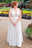 Wore this dress to get eloped, since we didn't want to wait for the big wedding next year. The dress was perfectly elegant to make the day special! Fit perfectly based on the reviews I read to guide my decision between med and large. Dress is a little boobalicious. - Brianne W.