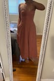 This looked really cute online but I was pretty disappointed when it came in person. It was definitely longer than I thought because I am pretty short, but what threw me off was the material. It resembles very rough, scratchy material that to me resembles more curtain fabric like. The color is also more dull, but the most redeeming quality was the pockets! - Tiffany P.