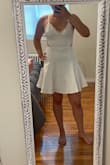 I loved this dress! I wore it for a night out and it was perfect. Super comfortable and can't wait to wear it again. It flows right and fits just perfect, and the material was very nice. It does hug my belly a little too much but I was okay with that! - Tiffany P.