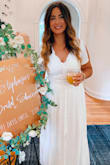I wore this to my bridal shower and it was absolutely perfect! I got so many compliments! I did have the bottom hemmed because I wanted it to hit my ankles and not the floor! - Stephanie P.