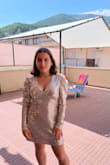 I bought this dress for my aunt's wedding in September and I am in love with it. When I saw it on the website, I immediately knew I had to buy it. It's just the perfect fit and I feel so comfortable & pretty in it. Also it's sooo shiny( I highly recommend it! - Mar S.