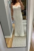 I originally bought this to wear for our quick court wedding next month before our big ceremony and reception next year, it fit great and looked amazing! So comfortable and easy to move in as well. I did decide to go with a shorter dress just because I don't want our court wedding to "feel" like a wedding and take away from our big day next year. I was sad to return it though because I absolutely loved it! - Jessica B.