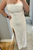This fit great! True to size and comfortable, kinda tough to get the straps right on your own but once I figured that out I loved it. I was between two dresses and ended up returning this one because my fiancé said the back straps reminded him of a prom dress lol but I loved it and thought it looked great! Don't mind the weird bulge under my chest, the bra thing I was trying out didn't really work with a fitted dress. - Jessica B.