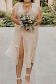 I used this dress for our elopement in San Francisco and it was really cute dress and I received a lot of compliments. Being an XL, it fit fairly well, but still a little tight, the zipper itself is hard to zip. I did wear a bra with my dress so that may have made the dress fit a little tighter than it's meant to but felt tight and I'm only a 36 DD. I wear sizes 14/16 in pants and the dress fit okay. The slit on the dress really high and being I am 5'5, it seems unusually high, the inner lining slit was also not as close together meaning, my underwear was close to showing lol (wind didn't help that) but we made it work!! I would say overall, a decent dress, I may have gotten size up just to make it a bit looser fitting. - Brenda P.