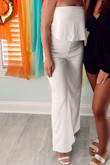I LOVED THIS JUMPSUIT. I would actually live in it. It is super comfortable and the material is very forgiving and easy to move around in. The top does not slip at all. I think it would be amazing on all body types. Everyone needs this jumpsuit! It's the perfect length for my long legged friends. It's so easy to dress this piece up. - Natasha B.