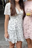 The dress fit really well I love it! My only small concerns were that it was a little too low cut for a regular bra and the liner gets wrinkly and you can kind of see them up close. Overall highly recommend. - Alyssa L.