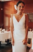 Elegant dress! Wrote it for our 10th wedding anniversary vow renewal. I'm short and have a small chest therefore I did need it hemmed and the straps were too big and even though I got those altered as well I had to wear dress tape to keep the top from pulling forward. - Leslie Z.