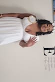 Had it hemmed and taken up at the shoulder's. After the alterations it was beautiful. I was going for a goddess look for my bridal shower and this dress was perfect. - Airelle R.