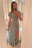 10/10, couldn't be happier! It runs a little long so I gotta get it hemmed, but otherwise perfect. Great color, so flattering, flowy. I was worried that the material would risk exposing me with the low neckline, but even slouching it keeps me covered lol. Can't wait to wear it, hopefully many times over! - Stacey S.