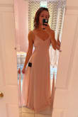 This dress fit super well, felt nice. The back is very cute, but the front was just a bit too simple for me. Lovely if that's the look you're going for! - Stacey S.