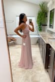 I ordered this dress as a possibility for engagement photos, but I returned it because I felt that I looked more like a bridesmaid. The dress is beautiful. The color is flattering and it is very flowy. If I were a bridesmaid or doing a maternity shoot or even just family photos this dress would be the one. - Daniela M.