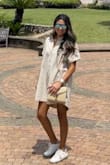 I initially purchased this shirt dress as a swimsuit cover up, and ended up using it as a shirt dress to explore San Antonio! It was perfect. I paired it with sneakers for a day look and of course it can be a cover up also. I love the linen fabric it feels high quality. Not see through at all. It is boxy and loose fitting, but that's the look of this dress and that's exactly what I love about it. - Daniela M.