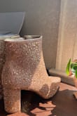 These are SUPER sparkly, way more that comes across in the photos - they're wonderful. Heel height is a good boat while still being sturdy and comfortable. Unfortunately I had to return these as the color is a bit more on the pink side than I expected and they clashed with my dress. Love them though. - Molly W.