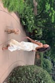 This sundress is so effortless and chic for casual summer days. It is super soft and ultra flowy. The color was a bit more yellow than I expected but it was still pretty. - Lindsey V.