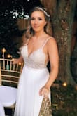 I think the pictures speak for themselves...the dress is gorgeous! Every person who has seen it or our pictures has raved about it. I felt so beautiful on our special day. The only things I had to do to the dress was hem the length and have cups sewn in for extra support (I'm a mom). Everything else fit me to a T. I'm so glad I picked this dress. I would wear it again and again if I could! - Sarah J.