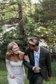 I wore this on my wedding day, and it was absolutely amazing! It was a 90 degree day in Wisconsin, yet the dress was breathable. My only comment would be that the arms were a bit tight. No "shout" dancing for me, but besides that, I'd highly recommend! - Morgan K.