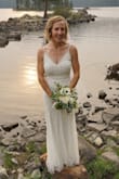 Amazing dress. I wore it for my ceremony on Friday night and reception on Saturday night.
I loved it so much, I chose to wear it again the second night (despite having a backup dress).
It fit like a literal glove right out of the box and felt like it was a boutique dress quality throughout my special day and moments.
I wore 3" heels and still had to hem it about 2". I also took scissors to the mesh beading top layer to 'hem' it shorter as well. It is well beaded, despite scissors in the middle of a pattern, the beading didn't fall apart. Dress was perfect in all ways, however...watch your undergarments. The beading helps smooth bumps, but I felt like I could see my Honeylove slightly...and my strapless bra showed in the back some...sadly in my pictures too...
Straps felt sturdy to me, and proved themselves as so after a few hours of dancing. - Caitlyn K.
