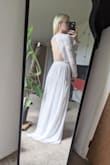 Definitely order a smaller size! After reading reviews I saw this runs big, & Im so glad that I ordered a size smaller than I usually would because it fits perfect. It's everything I expected and can't believe it looks so lovely for less than $100! And it came so quickly too!! - Rebbecca T.