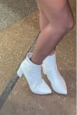 I've been looking for white boots like this for a long time that actually fit. These were so perfect & comfy, I love them! Would recommend! - Alexandrea R.