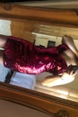 It's so pretty. The color is a little more red in some lights but I love it. It fits perfectly around my big tummy. - Kaitlyn G.