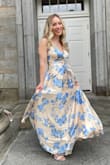 This dress is absolutely beautiful and fit so well. The only thing I had to do was hem the bottom since I am short. The straps are adjustable so it is easy to fit into. I wore it to a wedding and received so many compliments. - Amanda K.