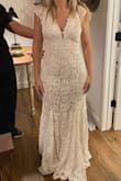 I ordered five dresses this was one of them. It's beautiful but more for a formal wedding (I'm getting married in a pasture) so wasn't what I was looking for, non the less this dress looks at least like a 1209 dollar dress, it's beautiful. - Kathryne B.