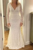 This was my runner up when trying on dresses. Ultimately it was the lack of the nude under slip that made me go with the other dress but this dress is beautiful! Great quality, if I kept this one I would have had to take it in a little on the top because I'm small up top and larger on the bottom, so if you have a bigger chest this would probably be a good option, without having to do alterations. The back is perfect. - Kathryne B.