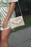 I got so many compliments on this clutch, I was even happier with it than I thought I'd be. Wore it twice for a bridal weekend (once with a sage dress and once with a champagne colored dress) and it looked great with both. - Erica H.