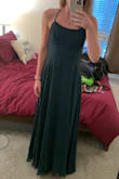True to size. Slit slightly higher than expected, but overlap prevents it from being too riskay. - Kelsey E.