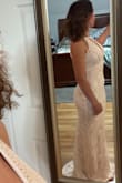 Impressed with the quality of the material for this price! If you are looking to feel just a little sexy on your wedding day I would highly recommend. Comfortable and sleek! I think I'm going with another dress, but this is a great dress!! - Jessica B.