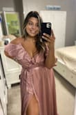 The material, fit, and color is BEAUTIFUL. I am so excited to wear this! However, the only downfall is for my big bust ladies. The button is not strategically placed for us, but a safety pin fixes it perfectly! Overall, a perfect dress and perfect for a wedding. - Gracie D.