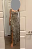 Just as pictured. If you have a little bit of belly fat and are conscious about it like me, you will like this dress. The fabric and pattern make the tummy area appear flat. The length is perfect for me - it hits right below my ankle. Happy with the purchase! - Sruti V.
