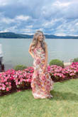 I bought this to go to a wedding las weekend and wow! It fit beautifully! True to size. Its a beautiful light material so it was perfect to wear outdoors in the summer. The colors are beautiful. I got so many complaints on it! Definitely one of my favorite dresses thus far!! - Nayara O.