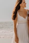 Perfectly flowy and flattering on the beach! Stretchy material in the back where it zips up, very comfortable. Wore without a bra and looked great. - Mikayla W.