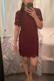 I usually weigh about 125 but gained some water weight due to medications. Even with the extra temporary 4-5 lbs the small fit nicely wasn't too tight (depends on the person some may like a tighter fit but I found this fit just right for the style and I don't like super tight clothes). I am a smaller frame though and my shoulders aren't that wide. For my height it's just above the knee but anyone taller it may be too short. Nice fabric and feel. Shipped super fast! - Channa T.