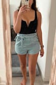 This body suit fit perfectly and it's so flattering! Highly recommend and a great staple item to have in your wardrobe. I love the V neck and I wanted something that was a bit more revealing. This was such a great purchase. Pictured with the Lulus chambray shorts. - Priya T.